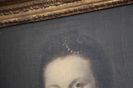Early 18th Century English School Portrait of a lady wearing a blue dress and pearls in her hair 27 x 21in.
